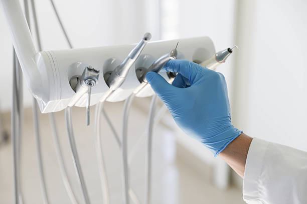 Professional Invisalign Clear Aligners technician working in Hemphill, TX